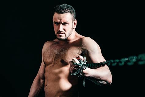 Strong Man With Perfect Body Posing Naked Shirtless Bodybuilder Standing With Chain Break