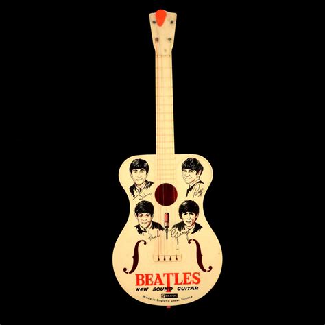 Lot 210 Selcol Toy Guitar The Beatles New Sound