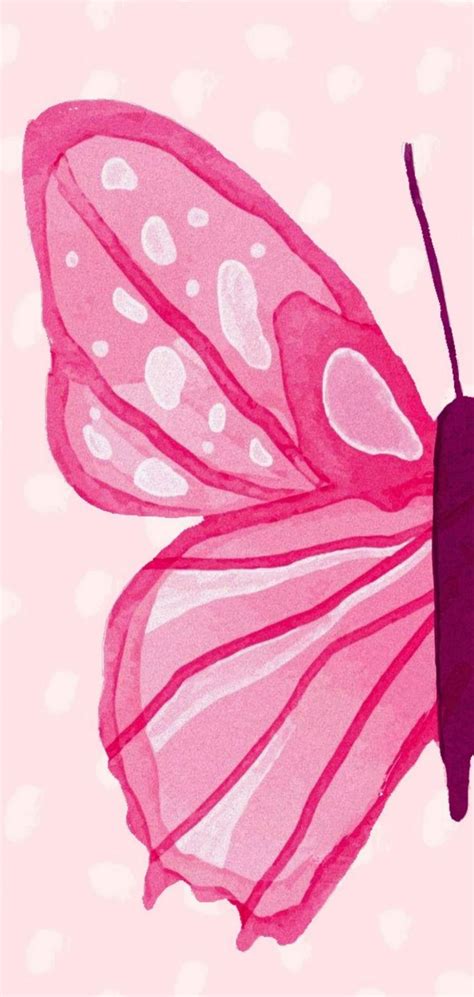 A Pink Butterfly With White Spots On It S Wings