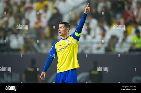 Cristiano Ronaldo of Al-Nassr FC in action against Al-Raed FC during ...