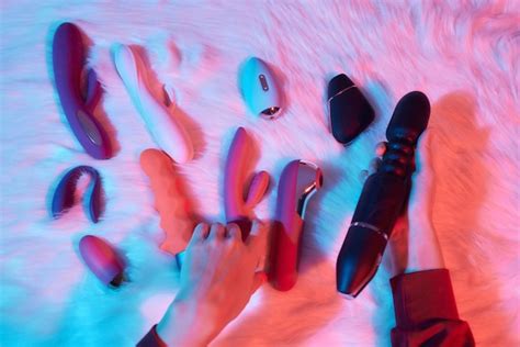 Premium Photo Desire Concept Woman Lying In Bed Holding A Dildo Vibrator In Her Hand To Help