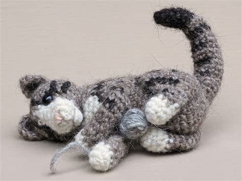 Playing amigurumi crochet cat