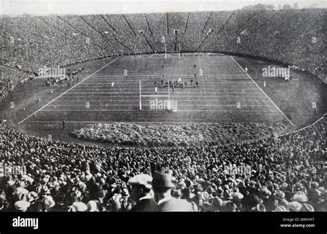 Photograph taken within The Yale Bowl, a modern stadium, showing an ...