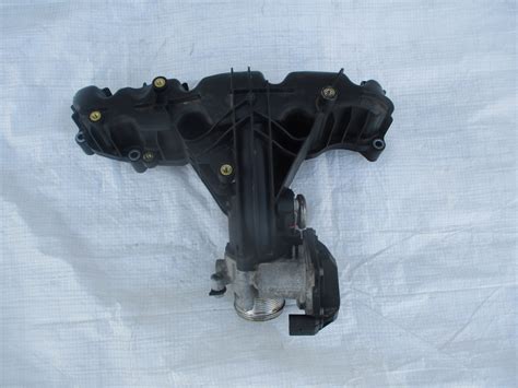 KOLEKTOR SSACY AUDI A3 Q3 SKODA SEAT VW 2 0TDI 03L129711AN 1051359S03