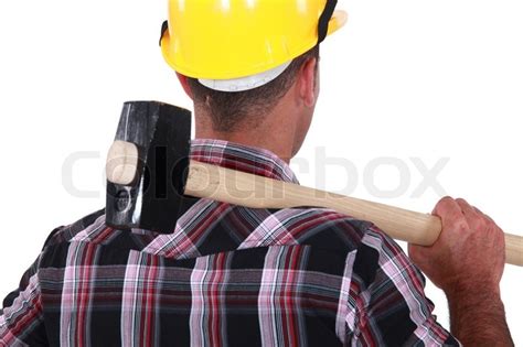 Worker Resting Large Hammer Over Stock Image Colourbox