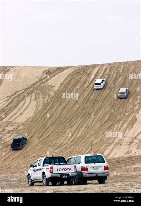 Dune Bashing, near Sealine Beach, Qatar Stock Photo - Alamy