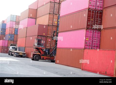 Trucks And Container Lifters In The Container Yard Stock Photo Alamy