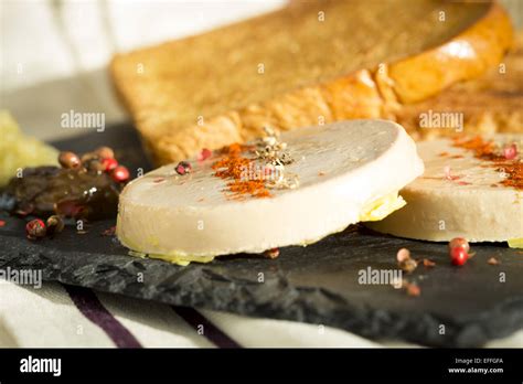 Foie gras, herbs and toast on slate Stock Photo - Alamy