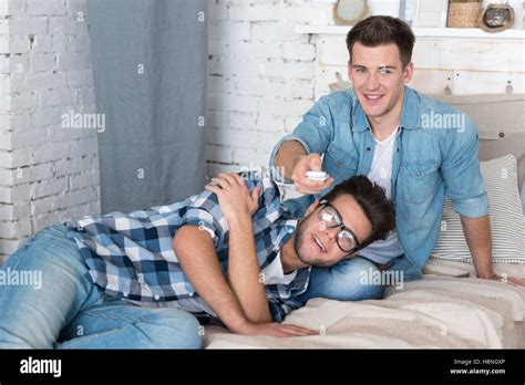 Gay Couple Relaxing Bed Hi Res Stock Photography And Images Alamy