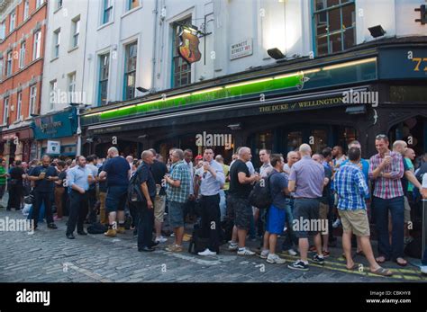 Busy Exterior Of Duke Of Wellington Gay Bar Soho District London