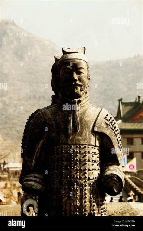 Terracotta warrior statue on a historic wall, Great Wall of China ...