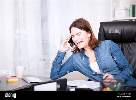 Close Up Very Happy Office Woman Laughing While Talking On The Phone