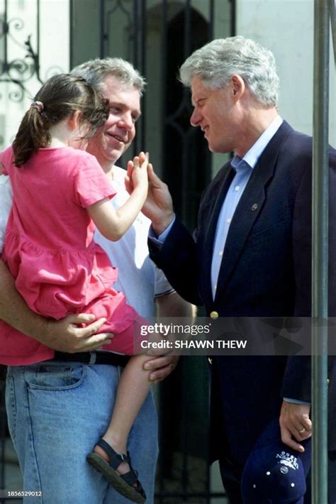 US President Bill Clinton greets White House Press Secretary Joe ...