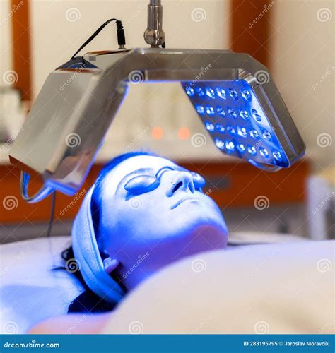 Young Woman Having LED Light Facial Treatment in Beauty Salon Stock ...