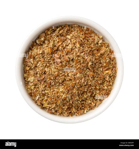 Aerial View Of Whole Ground Flax Seed Meal In A White Ceramic Bowl The