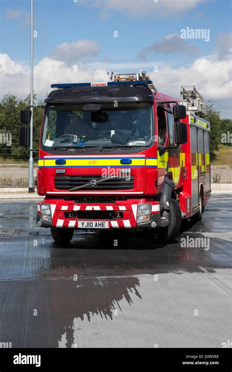 British Fire Engine Outside A Fire Station Stock Photo Alamy