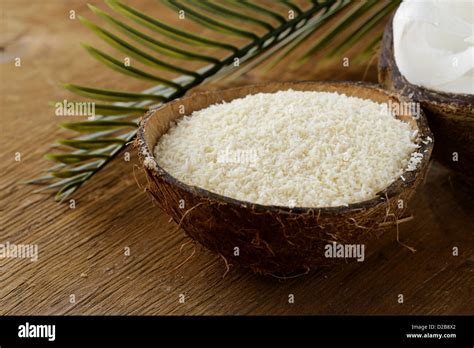 Grounded Coconut Flakes And Fresh Coconut Stock Photo Alamy