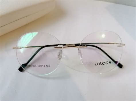 Универсальная безободковая оправа Dacchi D32823-C1 - Opticmir