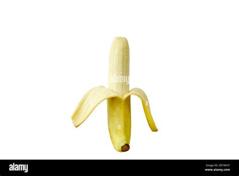 golden banana peel out on white background Stock Photo - Alamy