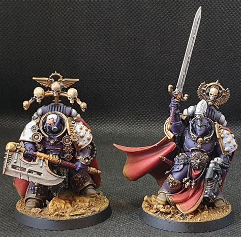 Two Painted Warhammers With Swords And Armor