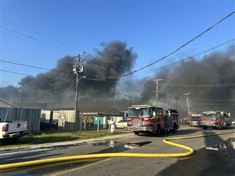 Fire at Tampa scrap yard spreads to apartments, displaces 3 families | WFLA