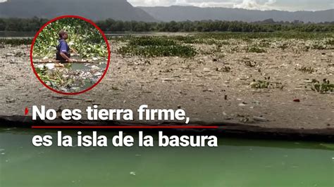 Surge isla de basura en el Lago Amatitlán en Guatemala se convierte en