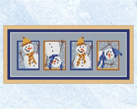 A Cross Stitch Pattern With Snowmen In The Window