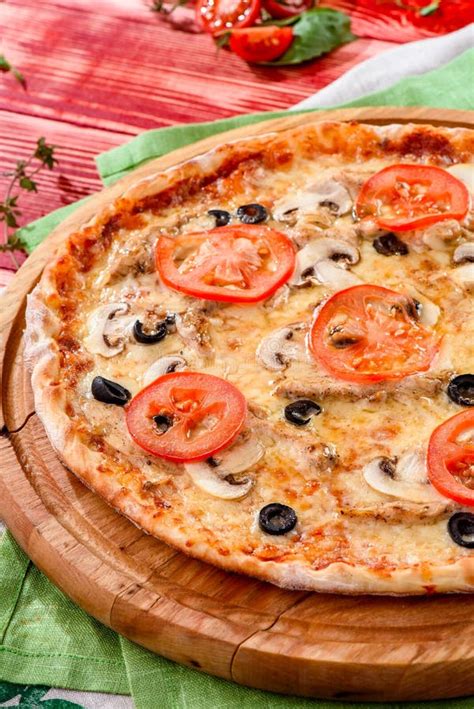 Fresh Italian Pizza With Mushrooms Chiken Tomatoes Cheese Olive On