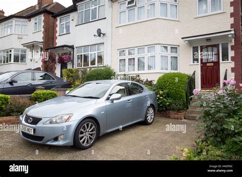 Cars Parked On The Front Drive Of Houses In Barnet North London