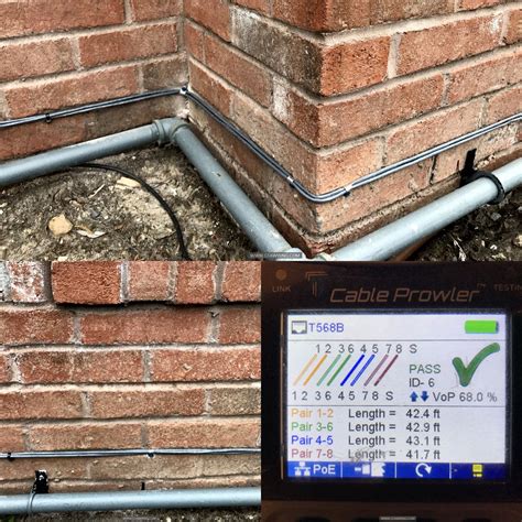 6 data lines installation. Outdoors grade Cat6e cable professionally clipped to house exterior ...