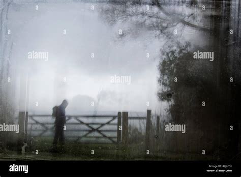 Hooded figure silhouette hi-res stock photography and images - Alamy