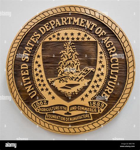 U.S. Department of Agriculture ) seal in the conference room of ...