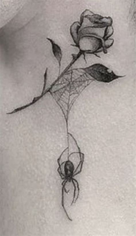 A Spider And Rose Tattoo On The Neck