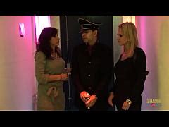 Captured Criminal Breaks Free To Pound The Blonde And Brunette Milfs In