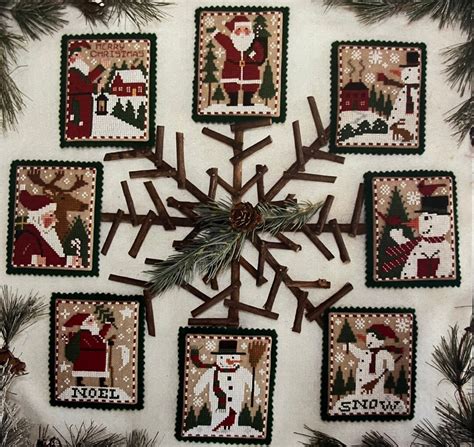 Prairie Schooler Santas And Snowmen Counted Cross Stitch Pattern