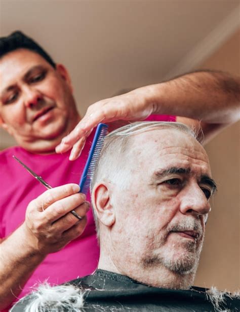 Premium Photo Old Man Getting A Haircut