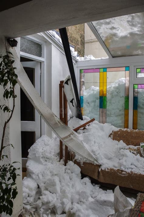 House Interior Snow Damage. Heavy Snow Crashes into Home. Stock Photo ...