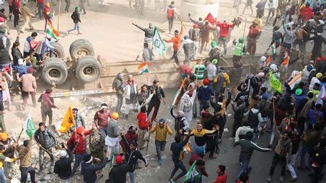 Indian Farmers Break Barricades Clash With Police In Massive Protests