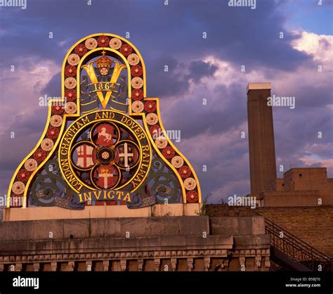 Railway Sign On Blackfriars Bridge And Tate Modern Behind London