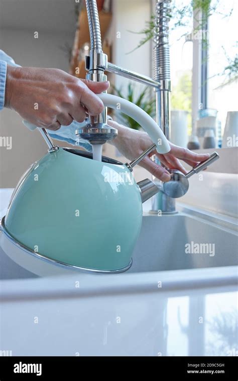 Filling Kettle With Water Hi Res Stock Photography And Images Alamy