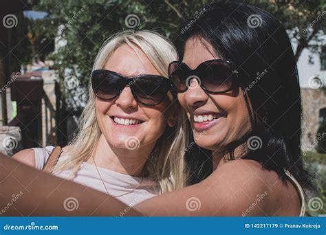 A Lesbian Couple Taking A Selfie And Laughing Stock Image Image Of Happy Fashion