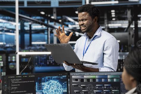 Frustrated technician angered by glitching data center equipment needed