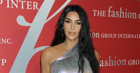 Kim Kardashian Slays In Tiny Green Bikini While In Hot Tub Photo