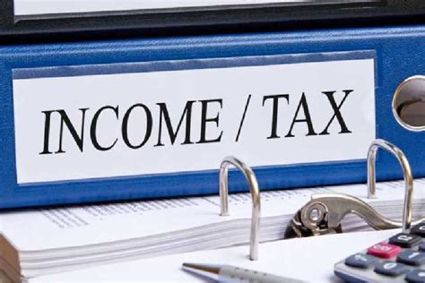 Income Tax Slabs Income Tax Slabs Under New And Old Regimes With