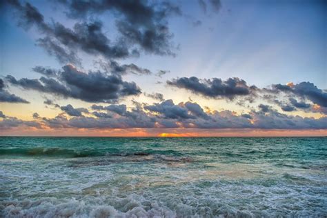 Premium Photo Sunset On The Caribbean Sea Clear Sky With Small Clouds