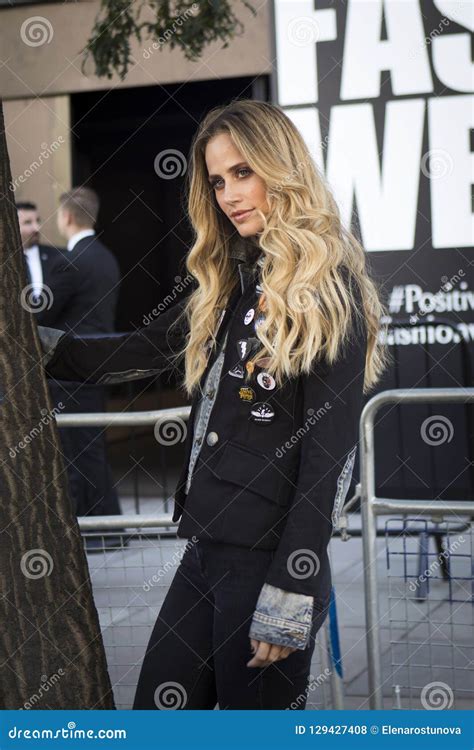 Skinny Blonde In Black Leather Trousers And Denim Jacket Editorial