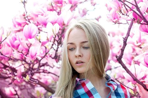 Sensual Portrait Of Beauty Blonde With Pink Flowers On Tree From Stock Image Image Of Natural