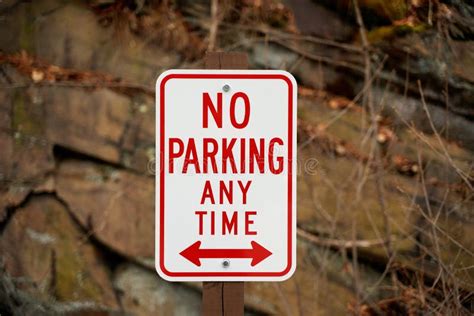 Sign no parking any time stock image. Image of blurred - 140087879