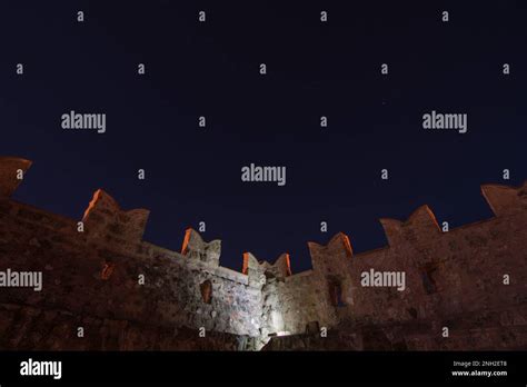 Night View Of Crenellated Walls Of La Grua Talamanca Castle Carini