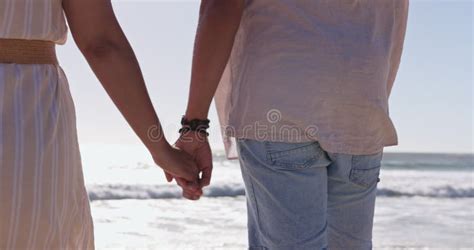 Beach Holding Hands Or Couple On Date On A Marriage Anniversary Celebration On Holiday Vacation